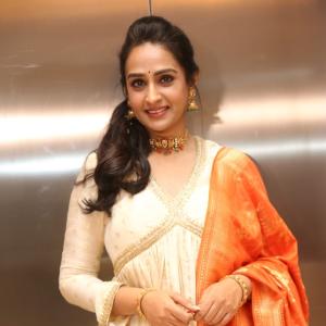 Actress Laya Elegant Ethnic Look in Cream Anarkali with Orange Dupatta