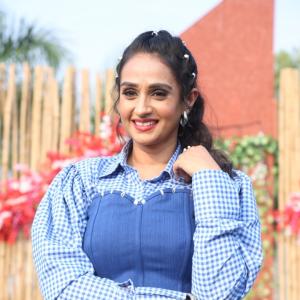 Stylish Actress Laya in Checkered Shirt & Denim Corset