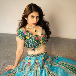 Actress Bandhavi Sridhar in Gorgeous Teal Lehenga with Emerald Necklace
