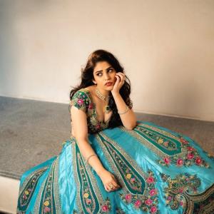 Actress Bandhavi Sridhar in Gorgeous Teal Lehenga with Emerald Necklace