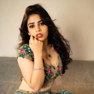 Actress Bandhavi Sridhar in Gorgeous Teal Lehenga with Emerald Necklace