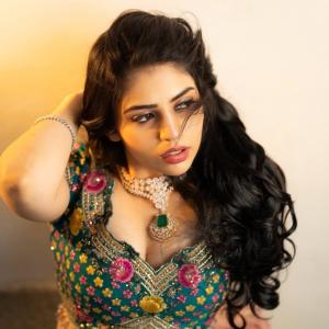 Actress Bandhavi Sridhar in Gorgeous Teal Lehenga with Emerald Necklace