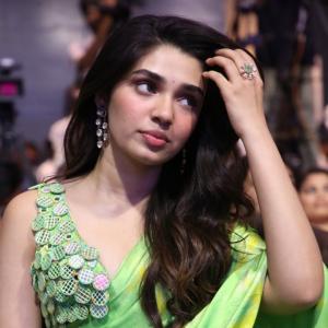 Actress Krithi Shetty Stunning Look in Green Saree