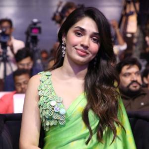 Actress Krithi Shetty Stunning Look in Green Saree