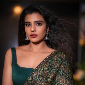 Grace and Beauty of Actress Aishwarya Rajesh in a Floral Saree