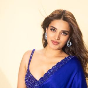 Actress Nidhi Agarwal Stuns in a Blue Embellished Saree