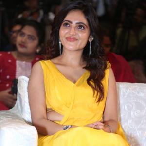 Actress  Athulya Ravi Shines Bright in Elegant Yellow Saree Appearance