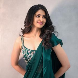 Actress Manasa Varanasi looks Elegant in Green Ruffled Saree