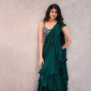 Actress Manasa Varanasi looks Elegant in Green Ruffled Saree