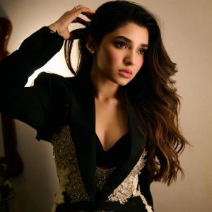 Actress Krithi Shetty Stuns In Glamorous Black Ensemble