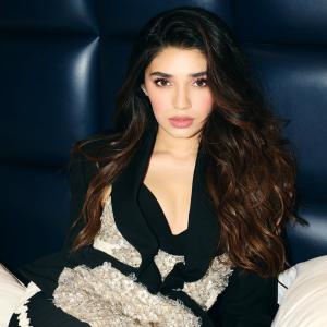 Actress Krithi Shetty Stuns In Glamorous Black Ensemble