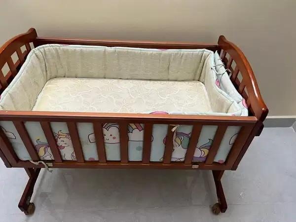 Babyhug Cradle with Mattress Side Bolsters Like New FirstCry Baby Bed for Sale