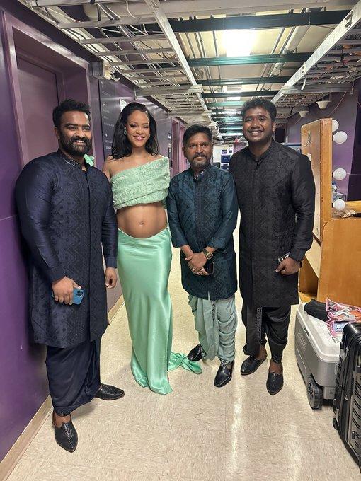 Stellar Pic  Rihanna poses with men behind Naatu Naatu