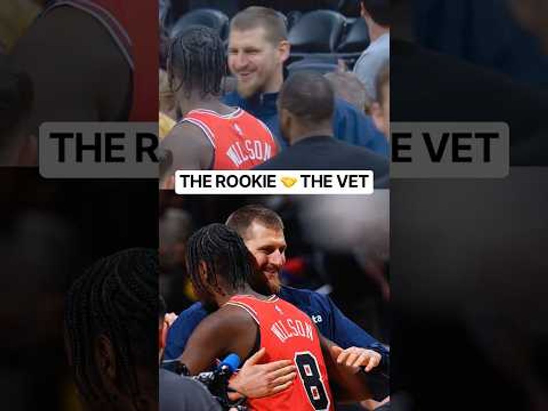 Caleb Wilson & Jokić having a laugh postgame