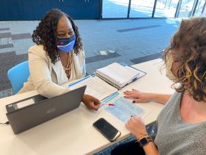 Get Covered Tenn meets in person to help client find affordable healthcare coverage.