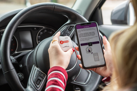 A 1st CENTRAL customer links their app to the sensor. (Photo: Business Wire)