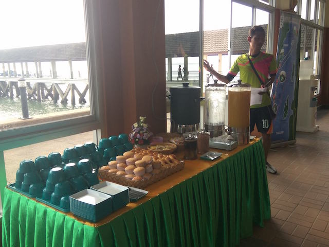 Guide explaining travel route at breakfast, Mergui Archipelago