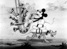 Screenshots from the 1932 Disney cartoon Trader Mickey