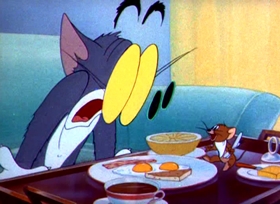 Screenshots from the 1944 MGM cartoon The Million Dollar Cat