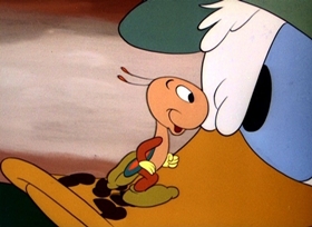 Screenshots from the 1949 Disney cartoon The Greener Yard