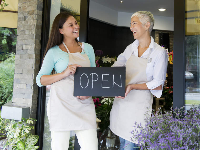 Two women opening a retail cannabis store practicing responsible sales
