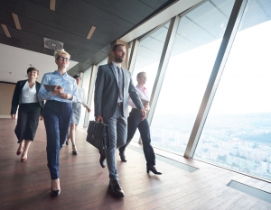 Business Development Dream Team Walking in a Modern Office Building