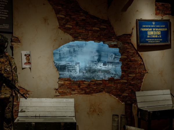 Footage from a drone attack on a Ukrainian target is displayed alongside trophies from the front, in an exhibition at a Tomsk local history museum. Tomsk, Russia, 2 April 2024