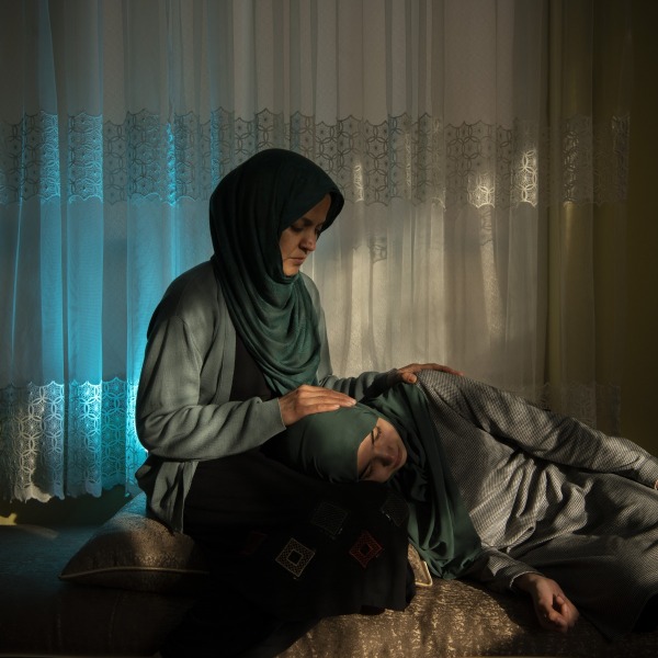 Wazhmah sits at home with her daughter Tahmeena (19). Wazhmah’s own education was halted during Taliban control in the 1990s, and she now sees history repeating itself. Kabul, Afghanistan, 6 February 2024