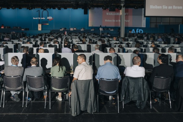 AfD party members cast their votes at a party convention to choose candidates for upcoming European elections. Magdeburg, Germany, 29 July 2023