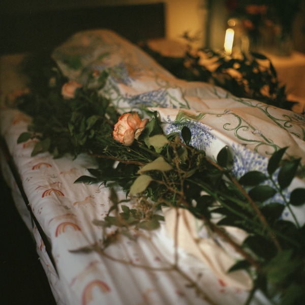 A guest’s body, wrapped in a death shroud. This guest caught a bad cold and discovered she had stage four lung cancer during a hospital visit. 2 March 2024