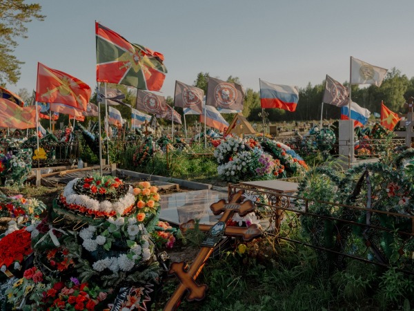 Russian flags and those of various units of the Russian defence forces and Wagner Group fly over the graves of soldiers killed in Ukraine. Tomsk, Russia, 30 August 2023