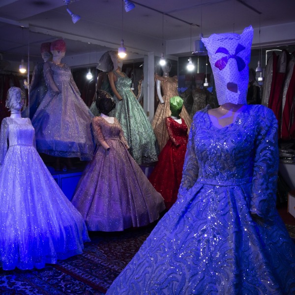 Plastic bags cover the heads of mannequins wearing wedding dresses. Women’s faces on advertisements, posters, and other public displays in Afghanistan are also erased or covered, in response to Taliban restrictions. Kabul, Afghanistan, 6 February 2024