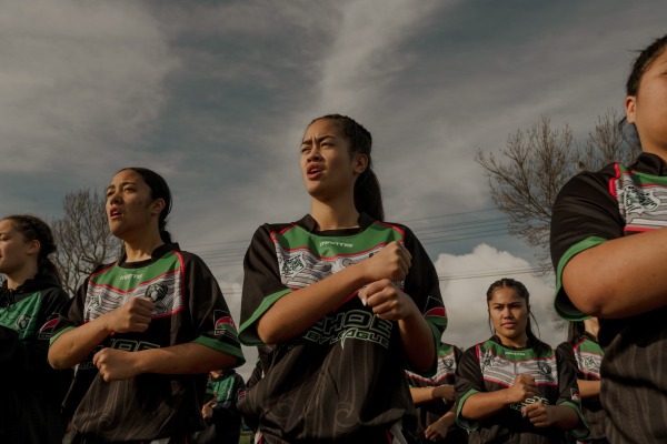 Mihiata Teepa (16) and her Tūhoe Māori Rugby League U16 teammates perform a haka during practice before a game. Rotorua, New Zealand, 12 January 2025