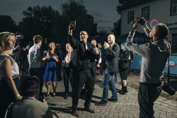 AfD party members and supporters sing a song with rewritten lyrics about deportation in an incident investigated by the police for incitement to hatred. Potsdam, Germany, 22 September 2024