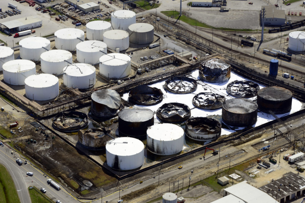 Members of the 2nd 80’s Response Unified Command continue to remove product from damaged tanks at the ITC Deer Park facility on March 27, 2019 near La Porte, Texas. Since March 19, 2019, more than 1,100 federal, state and local first responders, agencies, and environmental cleanup contractors have been on scene and actively assessing, booming and removing product from affected areas. U.S. Coast Guard photo by PA2 Johanna Strickland