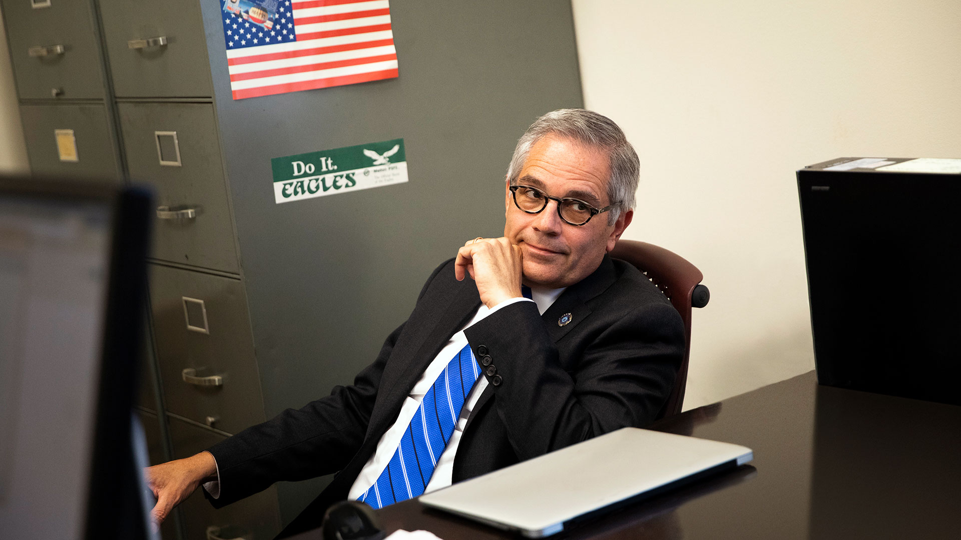 From Philly D.A., Larry Krasner sits at his desk frowning