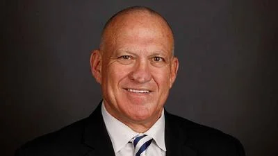 Dr. Charles L. Karr, President