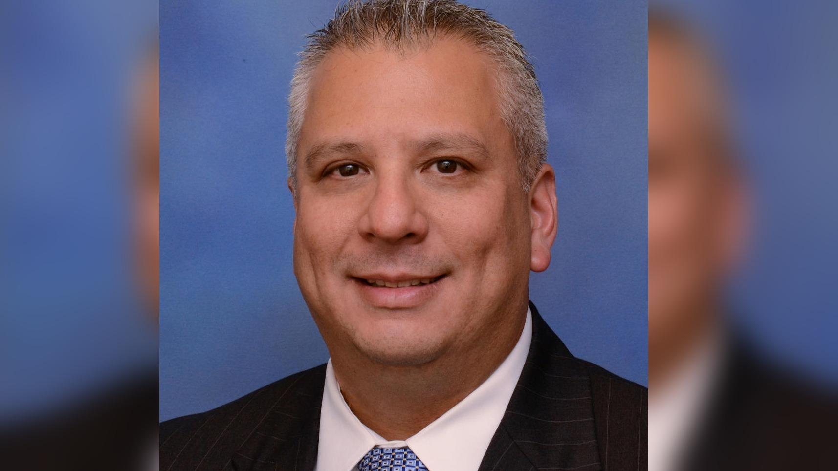 A blurred image of hands touching