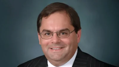  J. Christopher Lang, MHA, FACHE, Chief Executive Officer