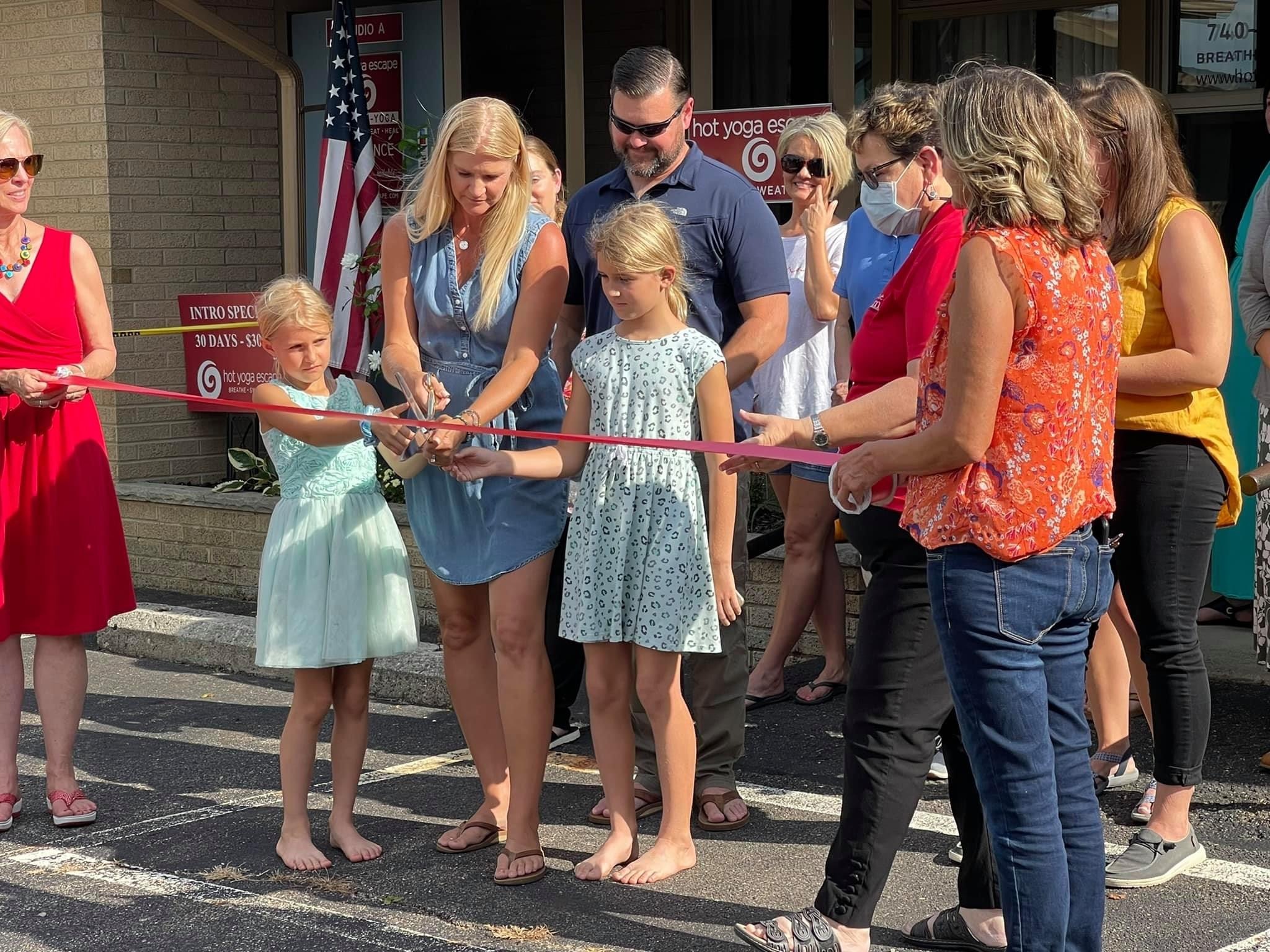 Hot yoga ribbon cutting