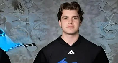 Andrew Schuster, football player