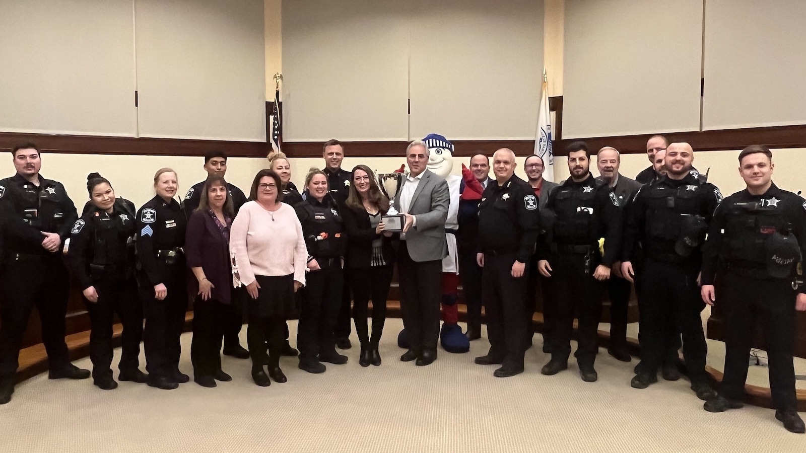 Bartlett PD's Milos presents award to Village 'The community showed up