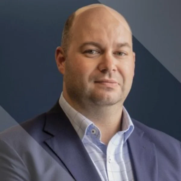 Webp patrick hillmann headshot