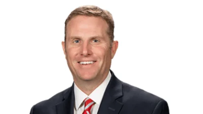 Senator Chris Gebhard discusses new finance curriculum law and local events