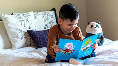 Medium kid reading