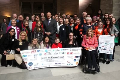 Bridget Tyrey, executive director, Gateway Hemophila Association (front row, furthest left holding banner), and sixty supporters of the MO All Copays Count Coalition at 2024 Missouri Advocacy Day on Feb. 6.