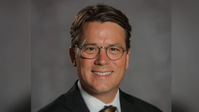 Shane B. Smeed, President