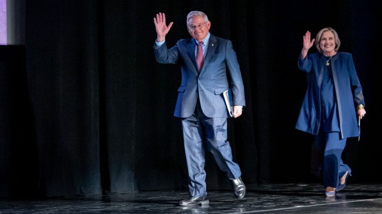 Senator Menendez and Secretary Clinton walking out onto the stage