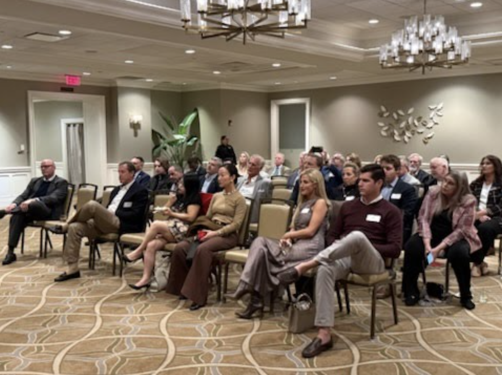 U.S. Sen. Eric Schmitt, R-Mo., right, speaks with Citizen Farmers co-founder Barrett Davie, left, at a private Oak Brook event on Nov. 20, discussing AI, national security, workforce, and government overreach. - Kristina McCloy