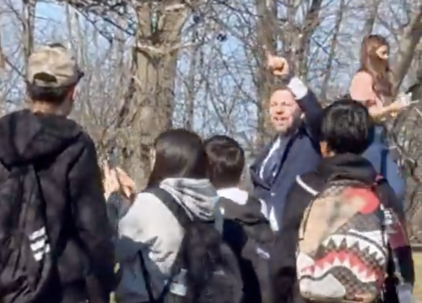 Kevin Morrison marches with students during a Prospect High School walkout, drawing criticism for allegedly organizing unsupervised protests without school or parental oversight.